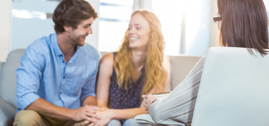 couple receiving help from couples therapy